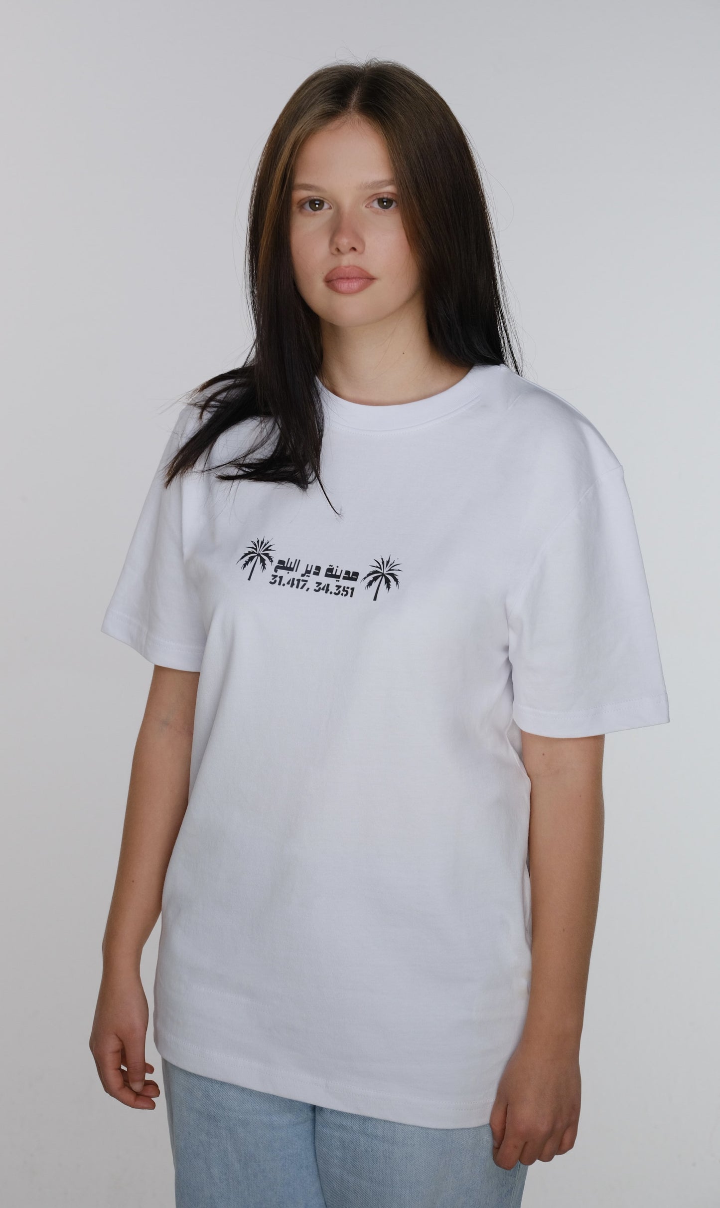 Model wearing the Deir al-Balah loose fit T-shirt, front view highlighting the relaxed style and fit.